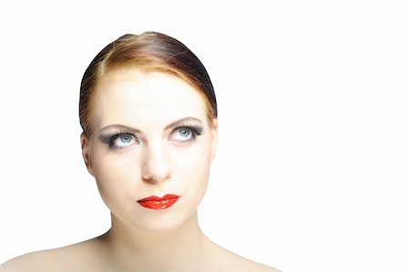 simsearch:400-04520503,k - Young beauty female face with red shiny lips and black eye makeup. colse-up. Stock Photo - Budget Royalty-Free & Subscription, Code: 400-04295945