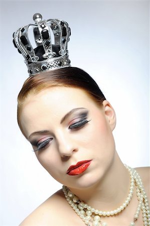 simsearch:400-04552932,k - elegant queen female face with red shiny lips and black eye makeup. colse-up. Stock Photo - Budget Royalty-Free & Subscription, Code: 400-04295949