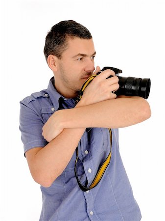 simsearch:400-04270950,k - professional male photographer taking picture . isolated on white background Stockbilder - Microstock & Abonnement, Bildnummer: 400-04296005