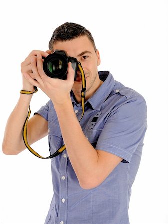 simsearch:400-04270950,k - professional male photographer taking picture . isolated on white background Stockbilder - Microstock & Abonnement, Bildnummer: 400-04296006
