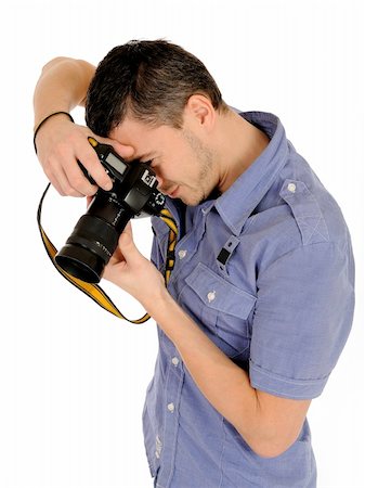 simsearch:400-04270950,k - professional male photographer taking picture . isolated on white background Stockbilder - Microstock & Abonnement, Bildnummer: 400-04296008
