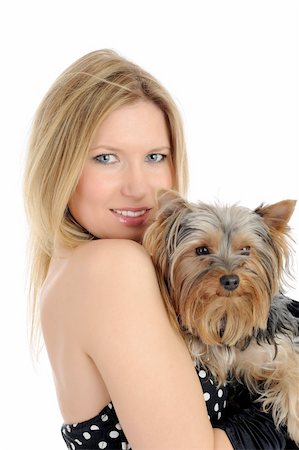 simsearch:400-06758392,k - Beautiful blong girl holding small cute york terrier dog. isolated on white background Photographie de stock - Aubaine LD & Abonnement, Code: 400-04296046