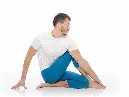 Handsome active man doing yoga fitness poses. isolated on white background Stock Photo - Budget Royalty-Free & Subscription, Code: 400-04296074