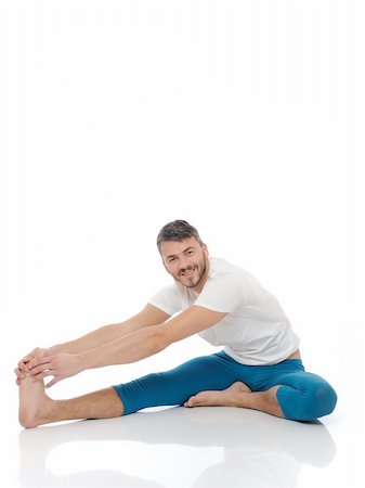 Handsome active man doing yoga fitness poses. isolated on white background Stock Photo - Budget Royalty-Free & Subscription, Code: 400-04296073