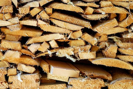 Pile of wooden logs and sticks for ecological heating Stock Photo - Budget Royalty-Free & Subscription, Code: 400-04296341