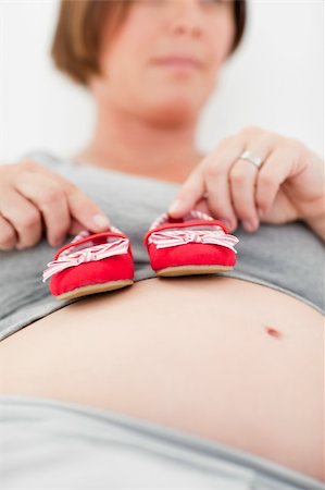 simsearch:400-05918412,k - Pregnant woman with kids shoes at home Foto de stock - Royalty-Free Super Valor e Assinatura, Número: 400-04297006