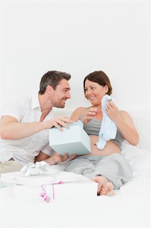 simsearch:400-04266844,k - Woman offering a gift to her wife at home Stock Photo - Budget Royalty-Free & Subscription, Code: 400-04297052