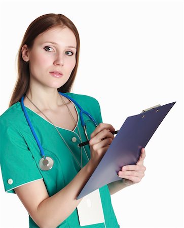 simsearch:400-04508758,k - Female doctor wearing green uniform and holding a clipboard with medical paperwork. Foto de stock - Super Valor sin royalties y Suscripción, Código: 400-04297872