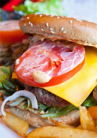 simsearch:400-05330097,k - Cheese burger - American cheese burger with fresh salad Stock Photo - Budget Royalty-Free & Subscription, Code: 400-04298226