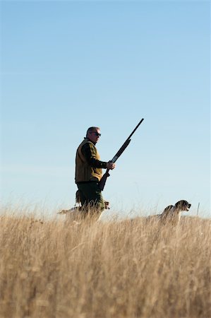 A hunter and his dog, a strong partnership Stock Photo - Budget Royalty-Free & Subscription, Code: 400-04298443