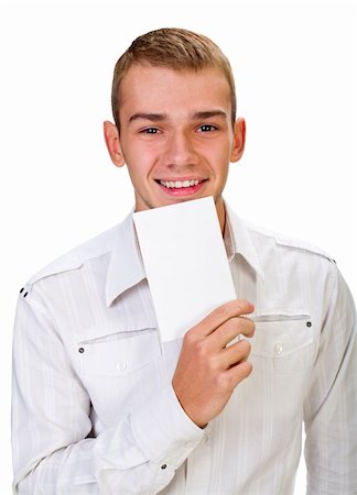 Portrait of a happy young man holding a blank board for texting against white Fotografie stock - Microstock e Abbonamento, Codice: 400-04298485