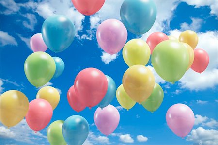 elio - Colorful balloons flying in the air Fotografie stock - Microstock e Abbonamento, Codice: 400-04298516