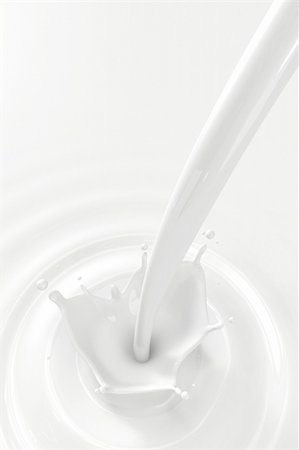 Pouring milk splash with copyspace Photographie de stock - Aubaine LD & Abonnement, Code: 400-04298532