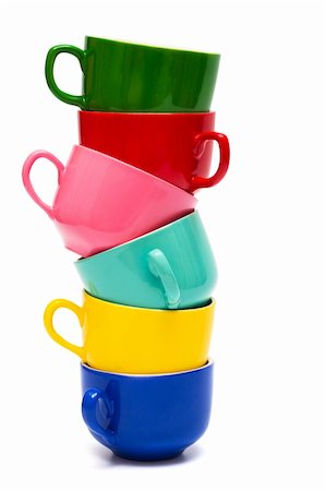 Beautiful color cups on a white background Foto de stock - Super Valor sin royalties y Suscripción, Código: 400-04298549