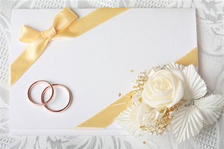 Wedding invitation card with gold rings and satin rose Stock Photo - Budget Royalty-Free & Subscription, Code: 400-04298672