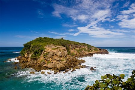 puerto rico island photo - Rocky island in surf off the north east coast of Puerto Rico Stock Photo - Budget Royalty-Free & Subscription, Code: 400-04298887