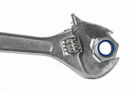 simsearch:400-05164273,k - The image of a wrench with a nut, isolated, on a white background Stock Photo - Budget Royalty-Free & Subscription, Code: 400-04298950
