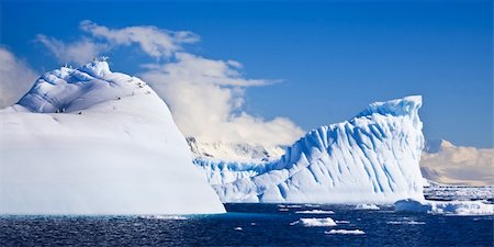 simsearch:841-07204336,k - Huge iceberg in Antarctica, beautiful winter background Photographie de stock - Aubaine LD & Abonnement, Code: 400-04299207