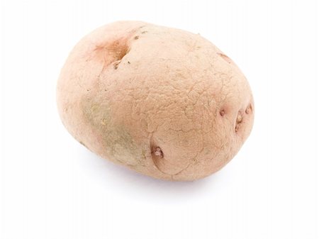 One tuber of a potato languid and with wrinkles is located on a white background Stockbilder - Microstock & Abonnement, Bildnummer: 400-04299282