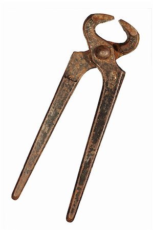 rusty tools - Detail of the punching nippers - hand tool Stock Photo - Budget Royalty-Free & Subscription, Code: 400-04299339