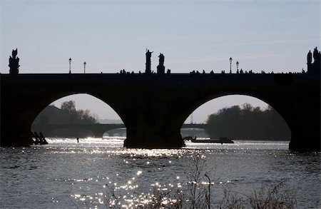 simsearch:400-05324581,k - The oldest preserved Prague bridge, founded by Charles IV in 1357. It was built after the  Petr Parler´s design in the High Gothic style. Its construction finished in 1402. The length is 515 m, the width 10 m.   Prague, Czech republic, Europe. Stock Photo - Budget Royalty-Free & Subscription, Code: 400-04299331