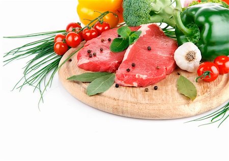 simsearch:400-05939266,k - raw meat with fresh vegetables isolated on white background Photographie de stock - Aubaine LD & Abonnement, Code: 400-04290366