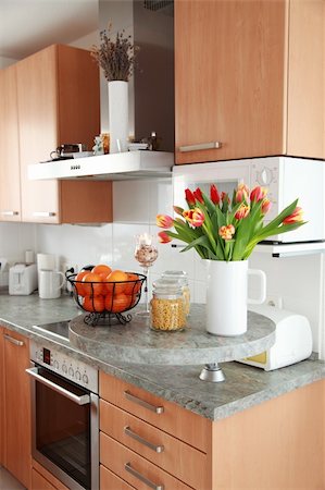 flower table kitchen - Kitchen and dining room interior in family house Stock Photo - Budget Royalty-Free & Subscription, Code: 400-04290375