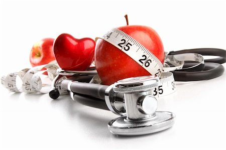 simsearch:400-05273035,k - Stethoscope with red apples on a white background Stock Photo - Budget Royalty-Free & Subscription, Code: 400-04291408