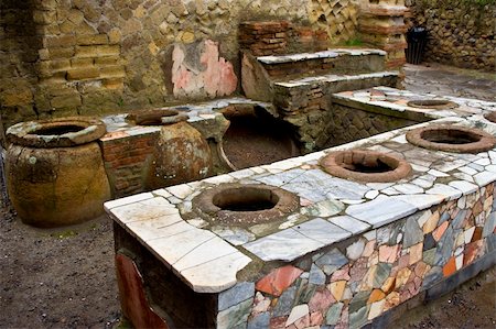 A thermopolium in Herculaneum (near Naples, in Italy), an antique fast food restaurant Stock Photo - Budget Royalty-Free & Subscription, Code: 400-04291663