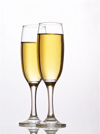 simsearch:400-04288408,k - Two champagne glasses. Isolated on white background Stock Photo - Budget Royalty-Free & Subscription, Code: 400-04291953