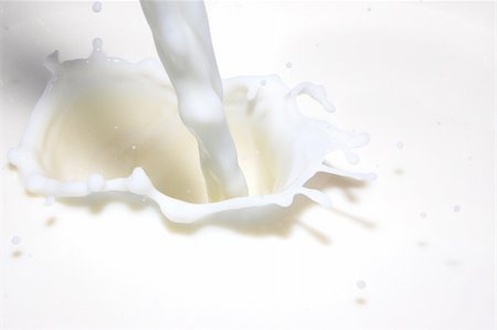 milk splashing into fresh milk with drops Stock Photo - Budget Royalty-Free & Subscription, Code: 400-04292121