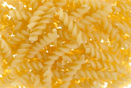 simsearch:400-04341378,k - Macro up view of Pasta fusili background. Fotografie stock - Microstock e Abbonamento, Codice: 400-04292229