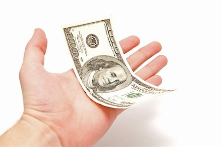 Hand holds 100 U.S. dollars on a white background Foto de stock - Super Valor sin royalties y Suscripción, Código: 400-04292240