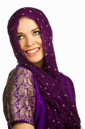 simsearch:400-06142860,k - Isolated portrait of a beautiful smiling indian woman in traditional clothing and head scarf Fotografie stock - Microstock e Abbonamento, Codice: 400-04292341