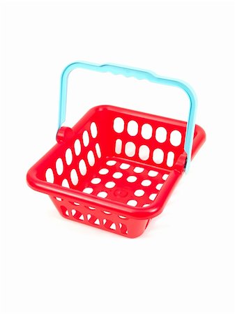 A shopping basket isolated against a white background Stock Photo - Budget Royalty-Free & Subscription, Code: 400-04292368