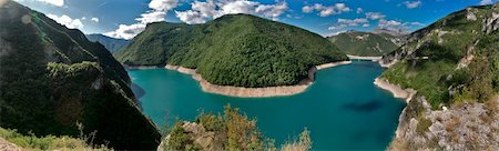 rocky mountains panorama - Pivsko lake in Montenegro panormic image Stock Photo - Budget Royalty-Free & Subscription, Code: 400-04292526