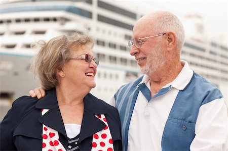 Senior Couple On Shore in Front of Cruise Ship While on Vacation. Stock Photo - Budget Royalty-Free & Subscription, Code: 400-04292787
