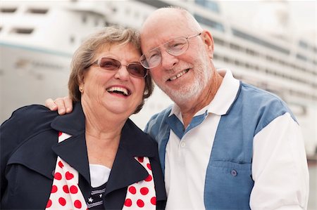 Senior Couple On Shore in Front of Cruise Ship While on Vacation. Stock Photo - Budget Royalty-Free & Subscription, Code: 400-04292788