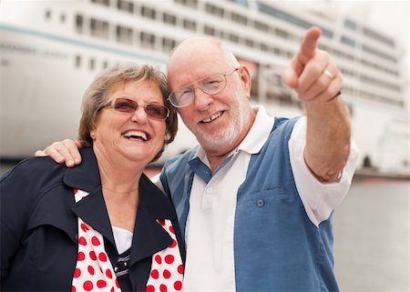 Senior Couple On Shore in Front of Cruise Ship While on Vacation. Stock Photo - Budget Royalty-Free & Subscription, Code: 400-04292789