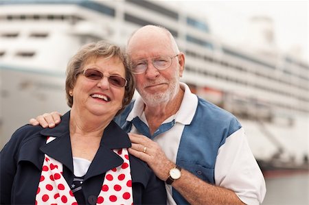 Senior Couple On Shore in Front of Cruise Ship While on Vacation. Stock Photo - Budget Royalty-Free & Subscription, Code: 400-04292790