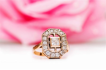 simsearch:400-05244104,k - Golden ring and rose at the background Stock Photo - Budget Royalty-Free & Subscription, Code: 400-04292878