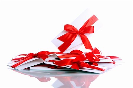 simsearch:400-04234530,k - Gift envelopes with awesome red bows isolated on white Stock Photo - Budget Royalty-Free & Subscription, Code: 400-04292958