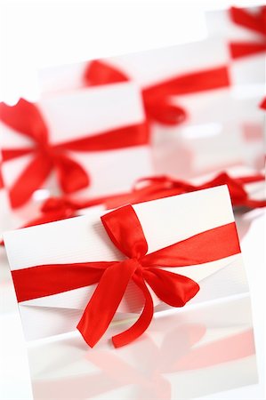 simsearch:400-04234530,k - Gift envelopes with awesome red bows isolated on white Stock Photo - Budget Royalty-Free & Subscription, Code: 400-04292963