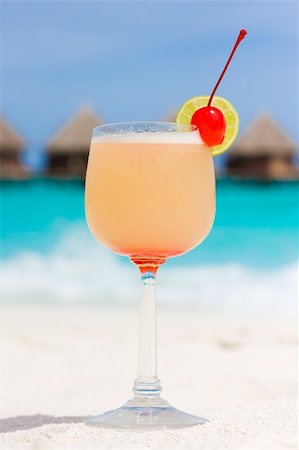 Cocktail on a beach with red cherry Stock Photo - Budget Royalty-Free & Subscription, Code: 400-04293016