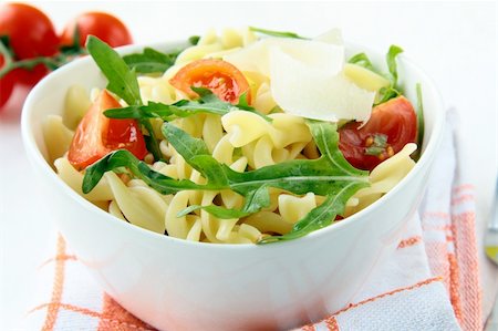 pasta salad with tomatoes and arugula in the Italian style Stock Photo - Budget Royalty-Free & Subscription, Code: 400-04293261