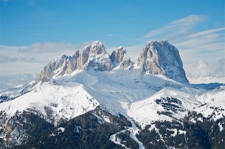 Sassolungo mountain range in the Dolomites, Italy. Blue sky. Foto de stock - Super Valor sin royalties y Suscripción, Código: 400-04304064