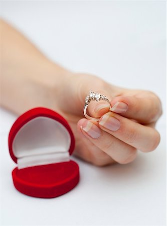 simsearch:400-05216412,k - an image of engagement ring held in hand Photographie de stock - Aubaine LD & Abonnement, Code: 400-04304382