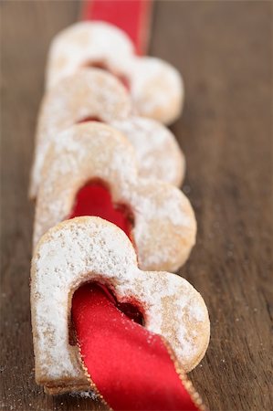 simsearch:400-07266420,k - Red ribbon with shortbread hearts. Shallow dof Stock Photo - Budget Royalty-Free & Subscription, Code: 400-04304606