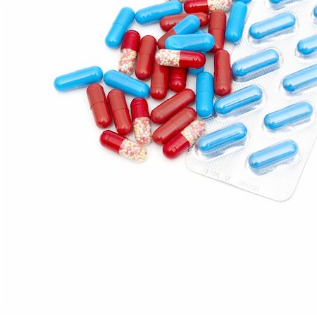 simsearch:600-03445205,k - macro of medical pills isolated on white background Fotografie stock - Microstock e Abbonamento, Codice: 400-04304979