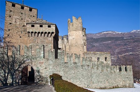 Fenis Castle is one of the most famous castles in Aosta Valley - Italy for its spectacular architecture and its many towers Stock Photo - Budget Royalty-Free & Subscription, Code: 400-04305777